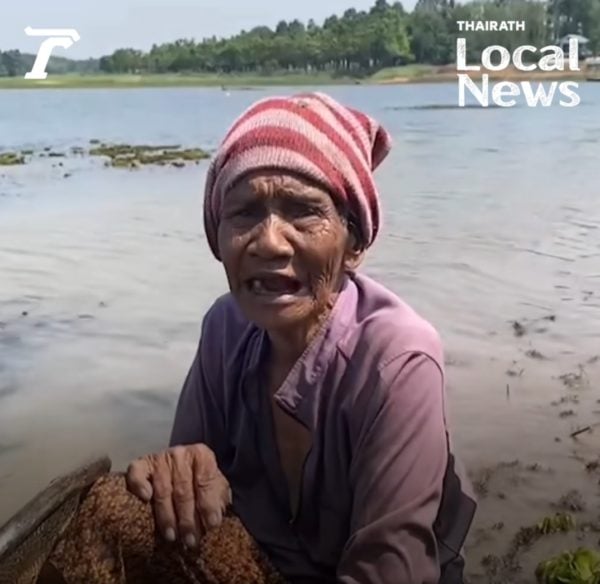 80-year-old woman in Thailand catches & sells fish to care for disabled son, receives overwhelming donations