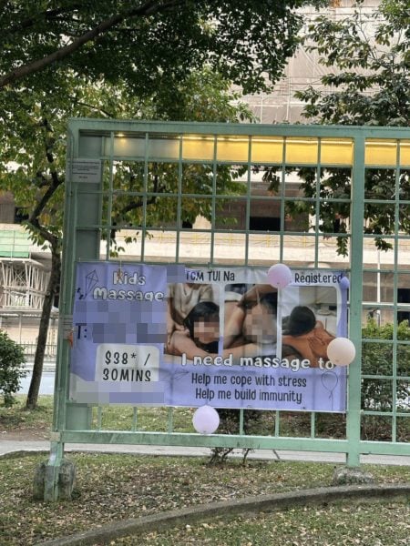 Banner in Jurong advertising massage services for kids shows them topless, TCM clinic changes graphics