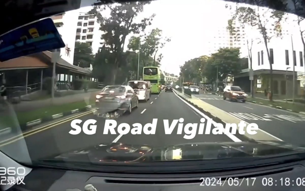 Car nearly hits young girl & guardian who jaywalked in Taman Jurong