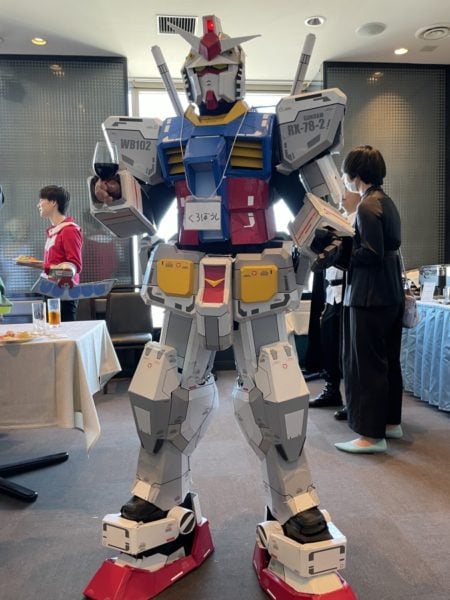 Man in Japan told to wear suit for wedding party, so he shows up in Mobile Suit Gundam