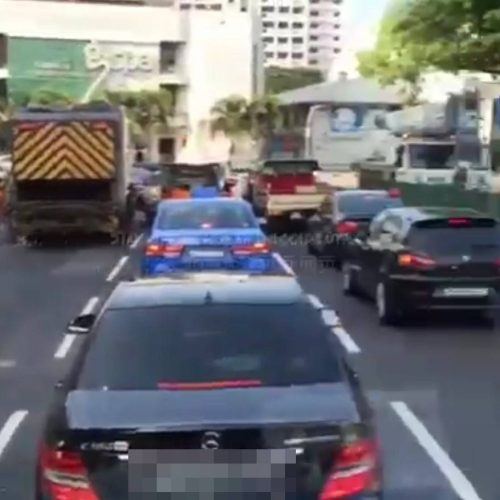 Video of child riding on cyclist’s back among traffic at Guillemard Road goes viral, netizens slam dangerous act